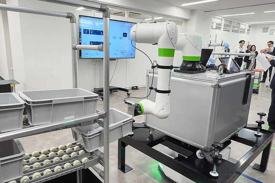 富士ソフトが異なるメーカーの搬送ロボットを統合管理　「MixFlit」の実機デモを新設「名古屋Lab」で公開