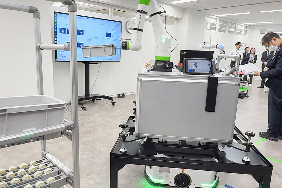 富士ソフトが異なるメーカーの搬送ロボットを統合管理　「MixFlit」の実機デモを新設「名古屋Lab」で公開