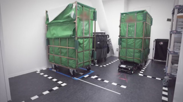 日本ホテル「メズム東京」に最新型リネン搬送ロボット「AISLE」導入　定時に使用済みリネンが入った各階の台車を自動で交換