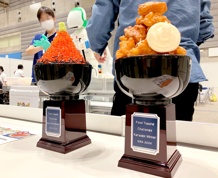 ICRA2024 Food Topping Challenge に鈴茂器工が「ご飯盛り付けロボット Fuwarica」を提供　審査員としても参加