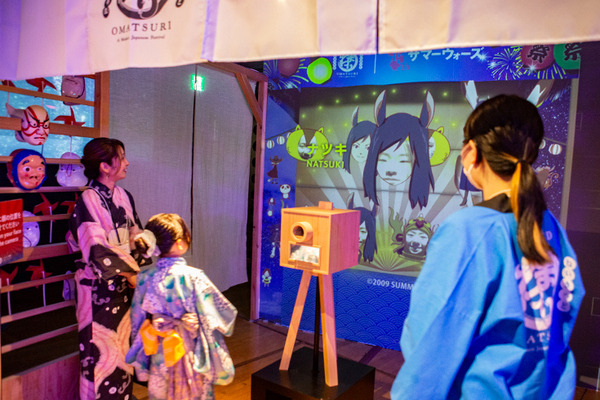 しゃべる「巨大AIだるま」のハイパー縁日が丸の内で開幕　全国のお祭りや盆踊りを楽しむ体験型「ネイキッドのお祭り」見どころレポート