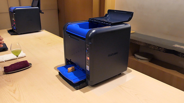 鈴茂器工「S-Cube」説明会を銀座「はっこく」で開催　職人不足に応えるコンパクトな寿司シャリ玉ロボット