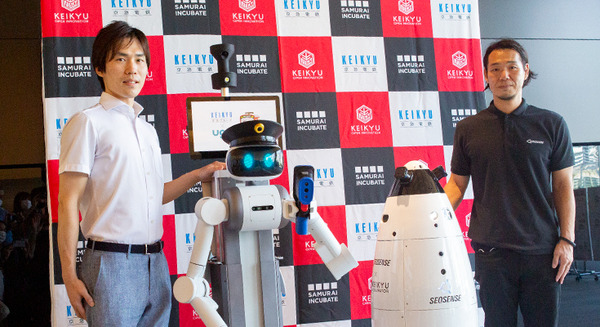 京急本社で警備/案内ロボットの実証実験　遠隔操作と自動運転で巡回と案内、検温も　シークセンスの警備ロボとMiraのアバターロボ 画像