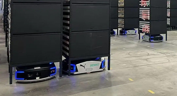 プーマの新物流センターのDX構築をギークプラスらが支援　自動棚搬送ロボット42台導入　既存システム変更なしに在庫の一元管理を可能に 画像