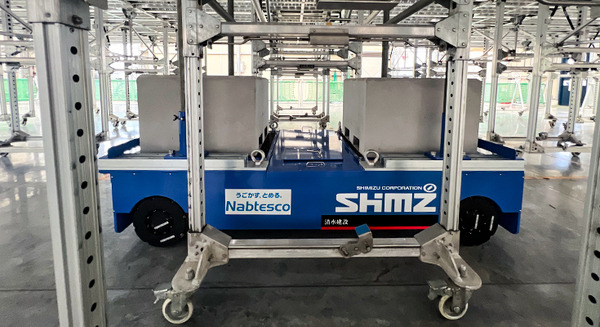 清水建設『ステージ足場移動台車』にAGV/AMR向け駆動ユニットを採用　ナブテスコが発表