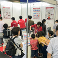 「ソニーブースでアイボとキュリオのステッカーをゲット!!」ロボカップゆる～いレポート