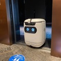 セブンイレブンがエレベーターと連携した自律走行ロボットで複数フロアへ配達実験　ソフトバンクと三菱電機らが協力