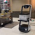 QBITと森トラストがロボットアームと複数の自動搬送ロボットで「館内の配送・集荷業務の自動化」実証実験　エレベータや自動ドアと連携