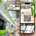 中吊り広告を読み取るとアート作品がAR表示「山手線でちょっと未来の乗車体験」SoVeCがARコンテンツを提供