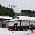 雪の中「ごはんセット」をドローンが届ける　福井県敦賀市でドローン配送によるスマート物流の実証実験