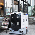 経産省と三菱地所 ロボットとエレベータが連携した「ロボットフレンドリー」な街づくりを本格化　NECやパナソニックのロボットでデモ公開