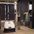 経産省と三菱地所 ロボットとエレベータが連携した「ロボットフレンドリー」な街づくりを本格化　NECやパナソニックのロボットでデモ公開
