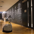 経産省と三菱地所 ロボットとエレベータが連携した「ロボットフレンドリー」な街づくりを本格化　NECやパナソニックのロボットでデモ公開