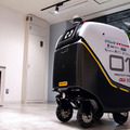 ティアフォー/川崎重工/KDDI/損保ジャパン/小田急/公園財団 自動配送ロボットの公道配送実証　西新宿で5Gと高精度測位を活用