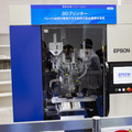 セイコーエプソンが3Dプリンタを開発中　フラットスクリュで汎用材料が使用でき、最終製品や部品の造形も可能　国際ロボット展で公開