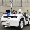 中部国際空港の貨物牽引車を名古屋市内から遠隔運転 ソリトンシステムズ、JAL、中部スカイサポートが実証実験