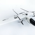 沖縄本島から座間味島へVTOLドローンによる生活物資配送実験に成功　NTTドコモの高精度測位を利用し、海上を約40キロ飛行