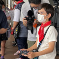 18mの「動く実物大ガンダム」を小学生が遠隔操作！巨大ロボットを動かす体験に笑顔と歓喜　GFY「ガンダムの仕組みを学ぶ教育プログラム」