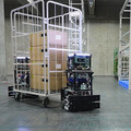 物流DXを加速するNECの最新技術　安全と効率を両立させる自動搬送ロボット制御／大量のAIカメラ映像をエッジとクラウドで分散処理