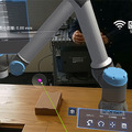 実機なくてもリアル現場にMR仮想ロボットを瞬時に設置し稼働確認　導入を効率化する「RoboLens」デモを公開　ネクストスケープ