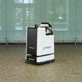 野村不動産HDとオカムラ、オフィスビル1棟全体の「掃除ロボット」活用で連携　エレベーター連携強化で高層ビル対応も目指す