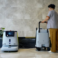 1台4役の清掃ロボット専用の移動式水タンクを発売　水路と電源の確保が難しい施設でロボットの給水・排水・充電を簡単に　Pudu