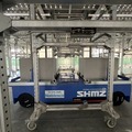 清水建設『ステージ足場移動台車』にAGV/AMR向け駆動ユニットを採用　ナブテスコが発表