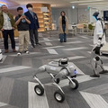 話題のヒューマノイドが歩き回る！犬型ロボや警備ロボ、搬送ロボなどが集結　GMO AIRが社内向けロボット体験会を開催